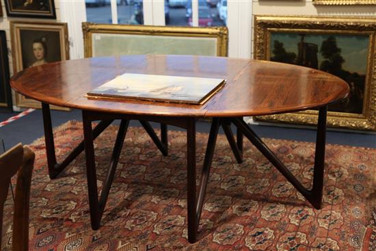 Kurt Ostervig for Jason Mobler, Denmark, 1960s. A rosewood drop-leaf dining table extends to 6ft 4.5in.